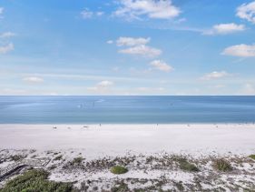 Beachfront condo with views, pools and tennis courts