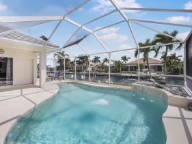 Waterfront home with pool table, heated pool and dock