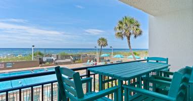 Have a coffee on the balcony while listening to the waves