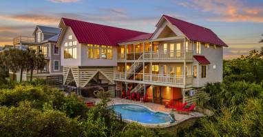 Experience coastal living at its finest in our 6 bedroom, 5 bathroom beachfront paradise on St. George Island. From the private pool to the screened-in deck with ocean views, every detail of t