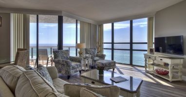 Living room - 55" flat screen TV - Million Dollar Views of the Emerald Waters