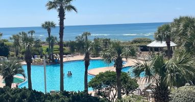 Endless views of our beautiful grounds, beach & massive pool