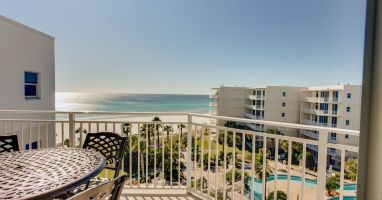 Dine outside while watching the waves roll up on the shore.