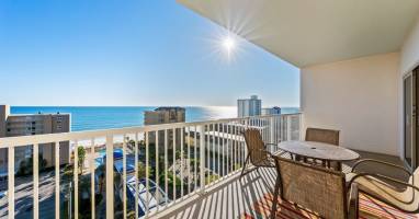 Ocean views stretch endlessly from your private balcony, where morning coffee tastes better with the sound of waves below.