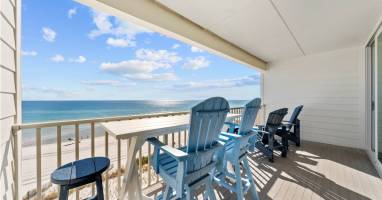 Relax on your private balcony with stunning ocean views. Comfortable seating awaits while you sip morning coffee or watch the sunset over pristine beaches.