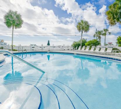 This idyllic pool situated directly across the street from the Gulf of Mexico. The location offers panoramic sunset views, while the warm breezes from the nearby ocean add to the natural beauty and serenity of this wonderful place