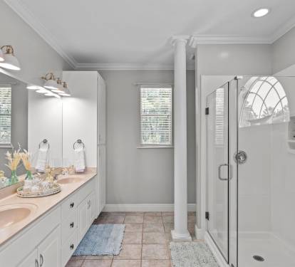 Clean, calm, and beachy — this spa-inspired bathroom is the perfect place to refresh and recharge.