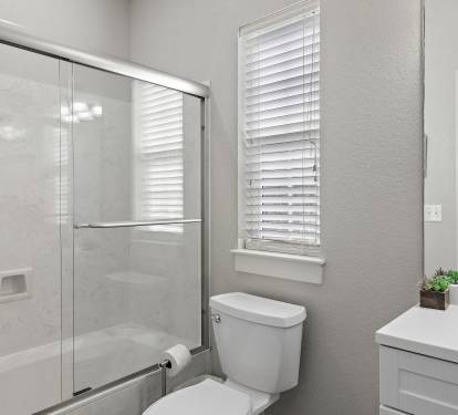 Bathroom #4: Private attached bathroom with shower/tub combo