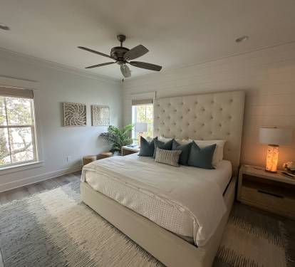 Spacious 2nd level king bedroom suite with full ensuite bathroom, tiled shower, dual vanity sinks, and newly remodeled outdoor shower.