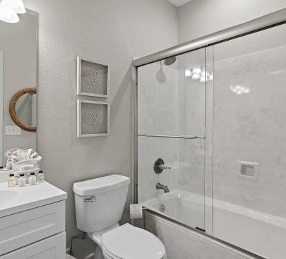 Bathroom #3: Private attached bathroom with shower/tub combo