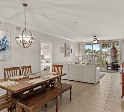 Dining room opens to living room, half bath, and bunk room