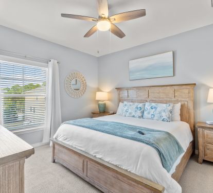 Master Bedroom with king bed, smart tv, and pack-and-play