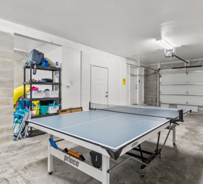 Large Private Garage with ping pong table and beach supplies