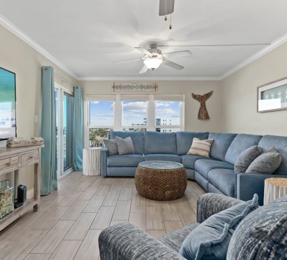 There is a sectional sofa that comfortably seats the entire family.