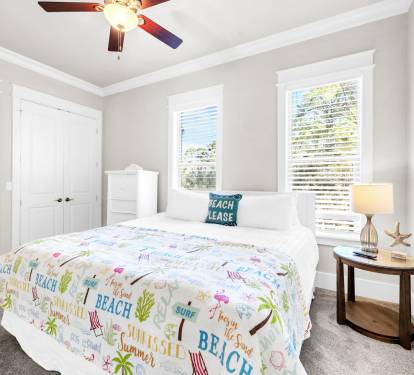 Second floor king bedroom with lots of closet space and smart TV.