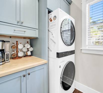 Coffee bar and brand new washer and dryer.