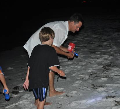 Looking for "beach treasures" at night!Get your flashlights ready!