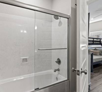 Bathroom #5: Private attached bathroom with shower/tub combo