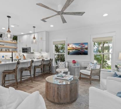 Living room - Enough seating for seven, plus four more at the kitchen counter