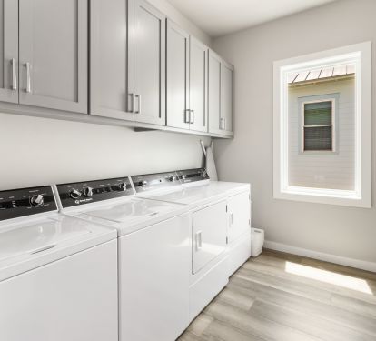 3rd Level Laundry Room with 2 Washers and 2 Dryers + Folding Counter