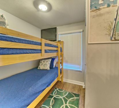 Bunk room has its own entry door for privacy for the kids when sleeping. 