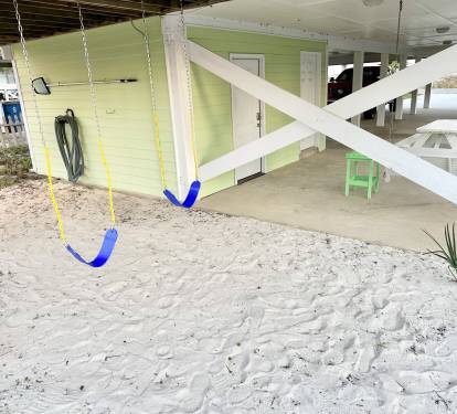Play area with swings