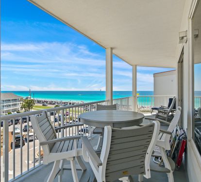 Gulf-front balcony with panoramic views and outdoor seating