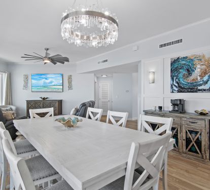 Dining area with seating for six and coastal chandelier