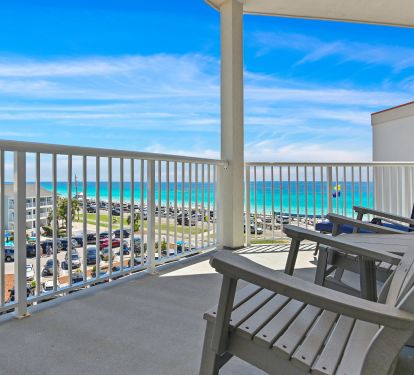 Gulf-front balcony with panoramic views and outdoor seating