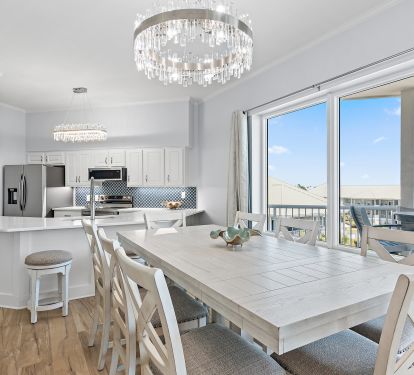 Dining area with seating for eight and coastal chandelier
