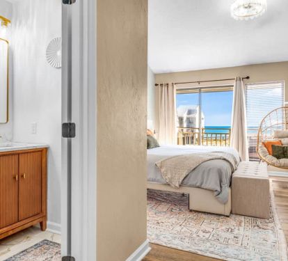 Master suite + gold bath with sunrise/sunset d&eacute;cor&mdash;your cozy retreat, day to night.