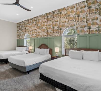 Bedroom 3 — one king and two queen beds