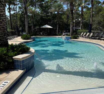 Community pool, shared only with guests & owners of Creek Park at Magnolia. Zero entry with water features, plenty of outdoor seating and seasonally heated.