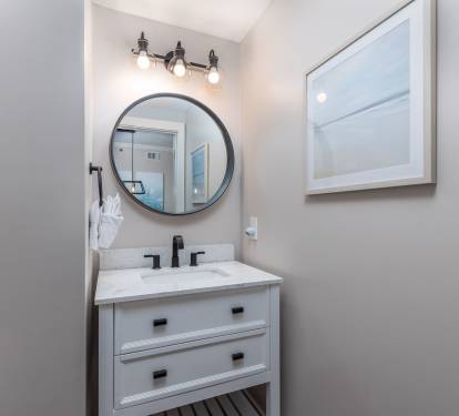 Newly renovated powder bath area off the dining space. 