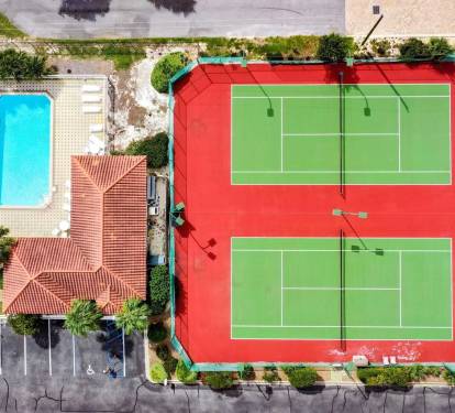 Tennis, Pickleball, and a Pool - Stay active or just
lounge poolside at Ciboney's family-friendly
outdoor amenities