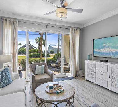 Bright Living Room - Relax in comfort just steps from the Gulf at this Leeward Key condo in Destin, Florida.