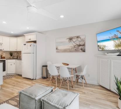 Large Smart TV and open floor plan. Catch up on your favorite series while crafting a home-cooked meal. 