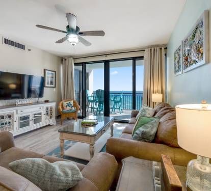 living room- comfortable seating for all guests with Gulf front views from the condo balcony.