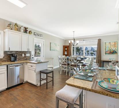 Main Kitchen area includes seating for 4 at the bar.