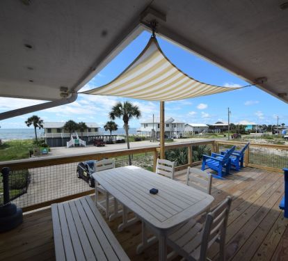 large dining table on the deck