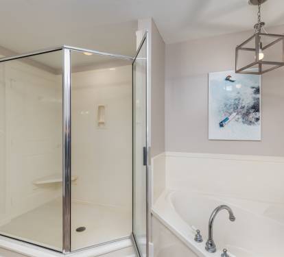 Oversized shower w/  full sized water heater for plenty of hot water. 