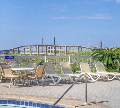 Boardwalk to beach on other side of pool (directly to right of unit)- no stairs!