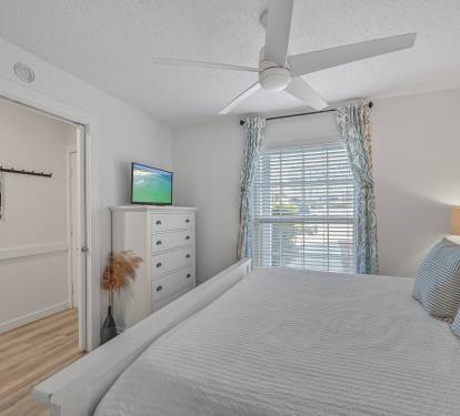 A view of the cozy master bedroom.