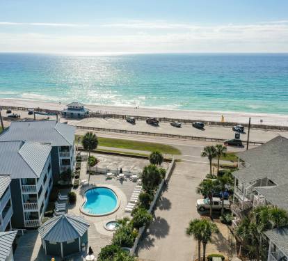 "Your beach getaway is just a few steps away - the perfect spot to relax, unwind, and soak up some sun!"