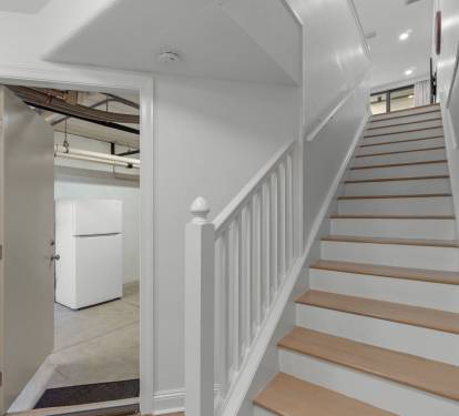 Garage Entrance/Stairs To Living Room