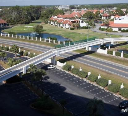 We are the closest unit to the gated walkover bridge.