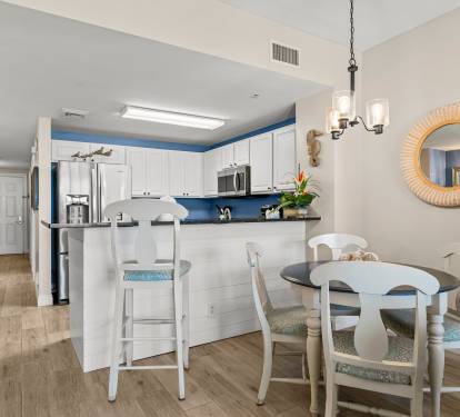 Dining table can expand to seat six