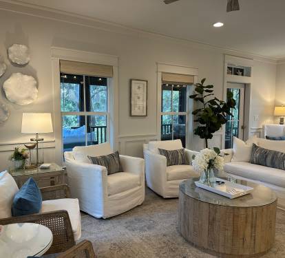 Spacious living room with seating for nine, and an additional four seats at the kitchen counter