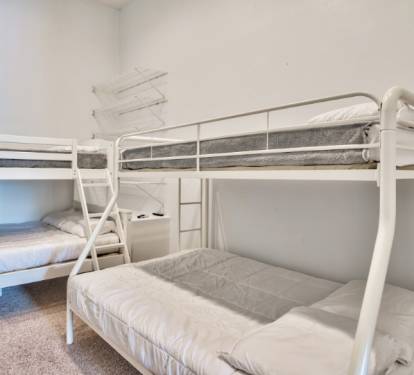 Bunk area with two twin-over-full bunk beds