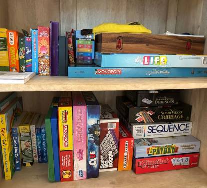 Cozy nights in are covered with our stocked game cabinet—choose from classic board games, cards, dice, puzzles, and kids’ books. Perfect for family fun or a rainy-day retreat! ?